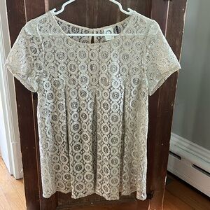 Sparkly top. Anthropology purchase. Worn year round. It’s in perfect condition.